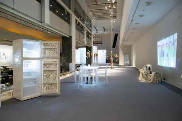 Avant-garde gallery exhibition space for immersive networking mixer and boutique pop-up event.