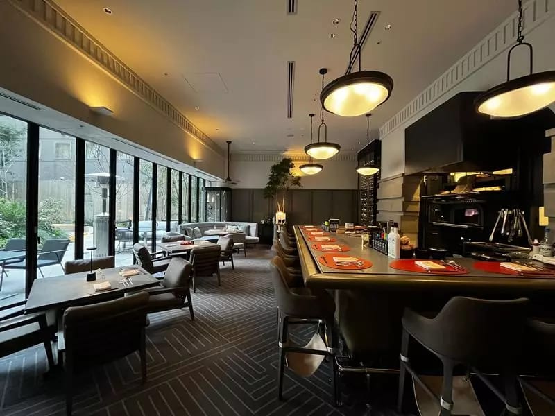 Upscale restaurant interior with ambient lighting for corporate dining and networking events.