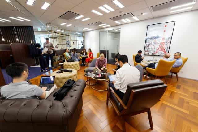 Modern co-working lounge in Tri-Seven Roppongi for agile collaboration and business meetings.