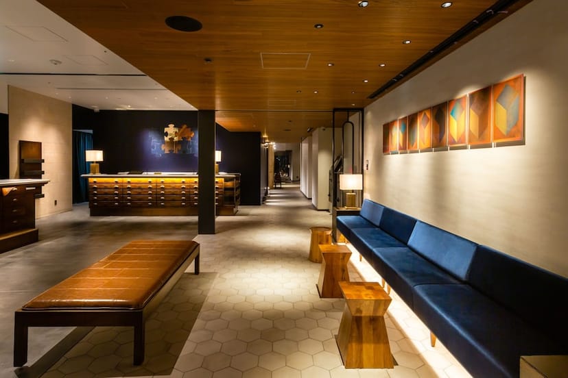 Upscale hotel foyer with tiered seating for boutique events and executive board meetings.