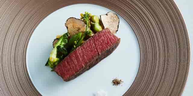 High-end plated entrée at PlaigaTOKYO, perfect for VIP gala dinners and executive meetings.