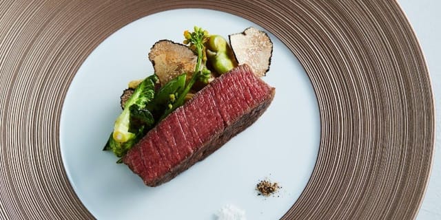 High-end plated entrée at PlaigaTOKYO, perfect for VIP gala dinners and executive meetings.