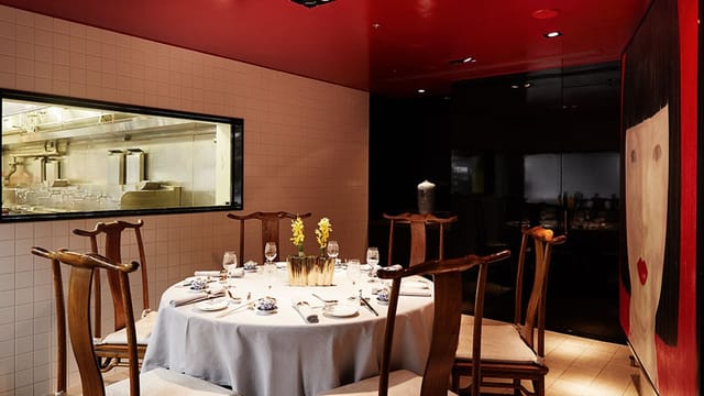 Private dining room with red ceiling at BALCON TOKYO for board dinners and VIP events.