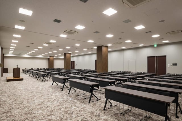 Ariake Central Tower ballroom in classroom setup for large corporate training or educational events.