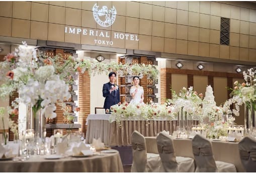 Luxury wedding reception with floral decor at the Imperial Hotel Tokyo, Peacock Room.