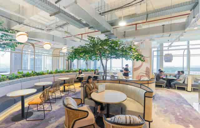 Modern biophilic breakout room for productive coworking and networking events at GoWork ASG Tower.