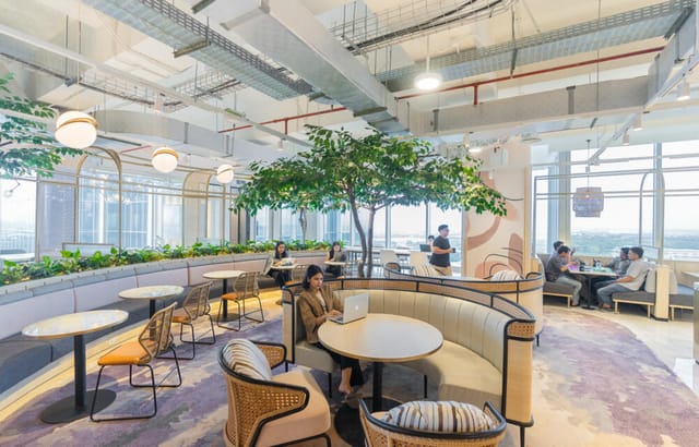 Modern biophilic breakout room for productive coworking and networking events at GoWork ASG Tower.