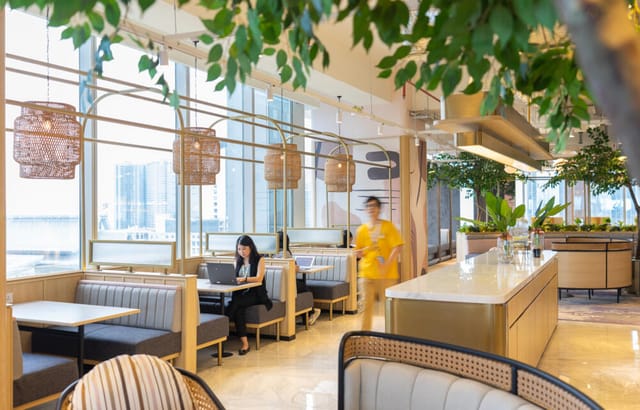 GoWork ASG Tower biophilic coworking space with private booths for corporate events and networking.