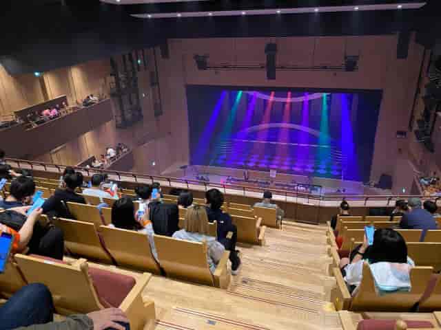 LINE CUBE SHIBUYA auditorium with wooden seating for keynote events and stage production.