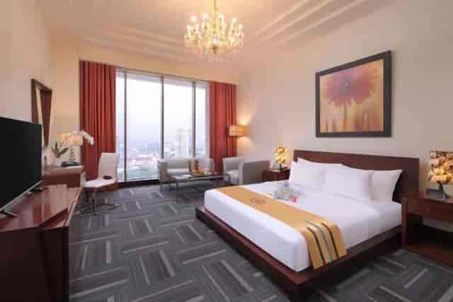 Premium business hotel room with workspace for VIP corporate events and professional meetings.