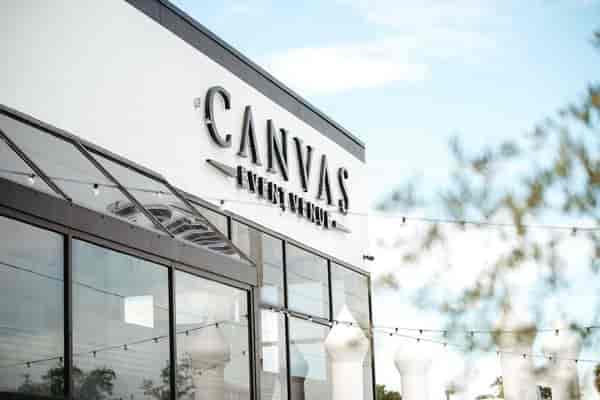 Modern Canvas Event Venue with floor-to-ceiling glass for corporate events and luxury weddings.