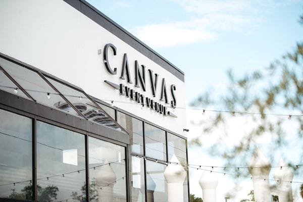 Modern Canvas Event Venue with floor-to-ceiling glass for corporate events and luxury weddings.