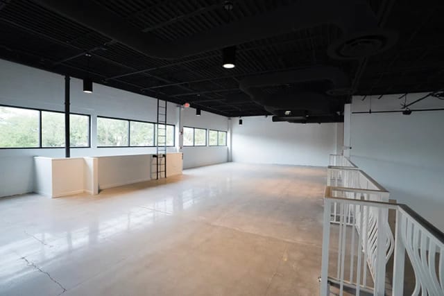 Industrial-chic Mezzanine at Canvas Event Venue for gallery openings and networking receptions.