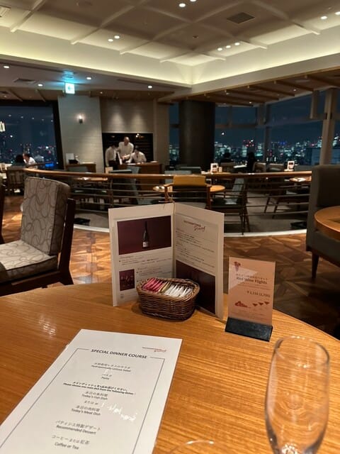 High-end hotel lounge with panoramic city views, ideal for networking events and VIP receptions.