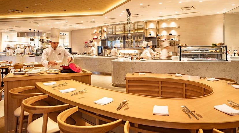 High-end open kitchen banquet hall for immersive chef-led dining and corporate events.
