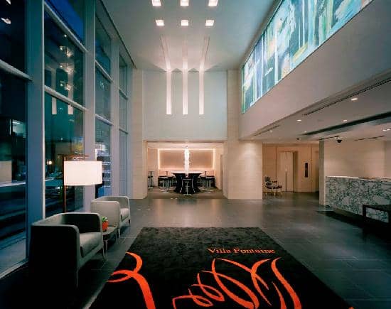 Modern Hotel Yaenomidori Tokyo lobby with high ceilings for executive meetings and receptions.