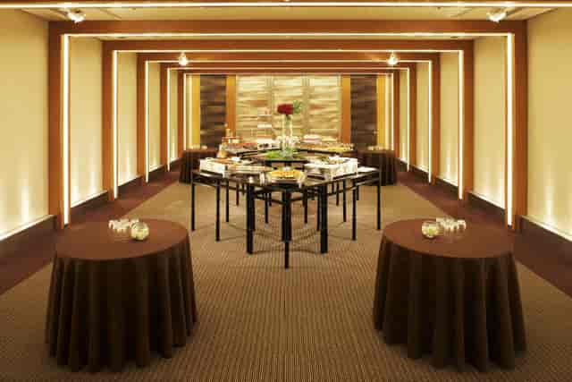 Banquet hall at Hotel Metropolitan Edmont Tokyo with tiered catering station for corporate events.