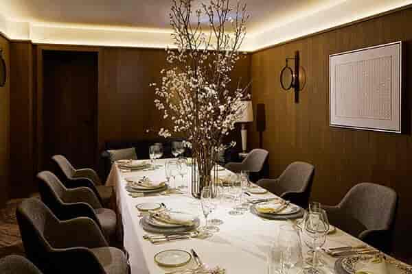 Hudson Lounge private dining room with wood paneling for executive board meetings and events.