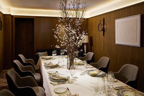 Hudson Lounge private dining room with wood paneling for executive board meetings and events.