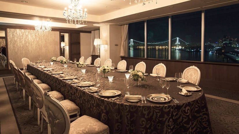 Boardroom-style private dining room with bridge views for executive dinners and networking events.