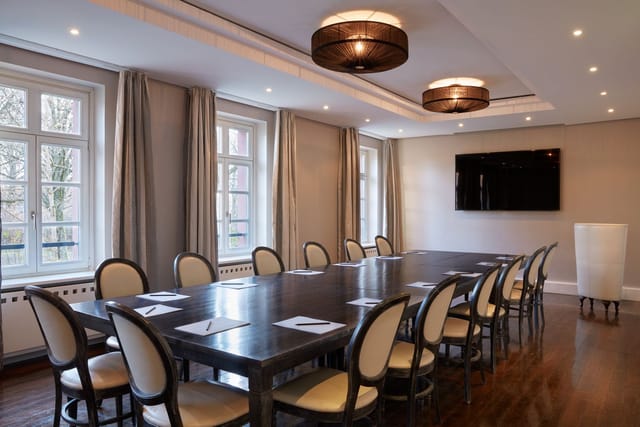 Boardroom setup at Gerbermühle for professional executive meetings and strategy sessions.