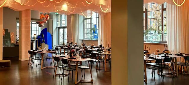 Modern GOOSE Eventspace with banquet seating, perfect for corporate dinners and social events.