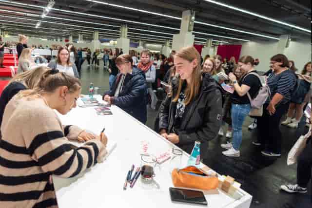 Frankfurter Buchmesse author signing area with queue management at a book exhibition event.