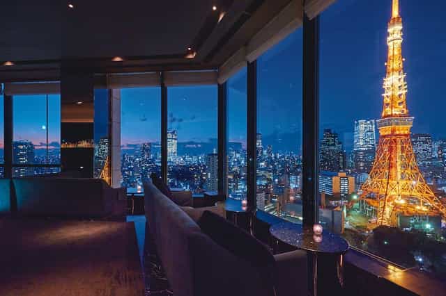 Luxury suite event venue at The Prince Park Tower Tokyo with iconic Tokyo Tower skyline backdrop.