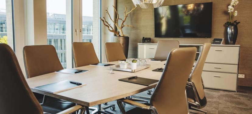 Modern boardroom in Nextower with natural light for corporate meetings and executive sessions.