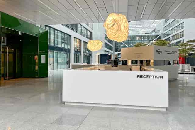 Modern meeting room entrance at THE SQUAIRE, professional corporate lobby for business events.