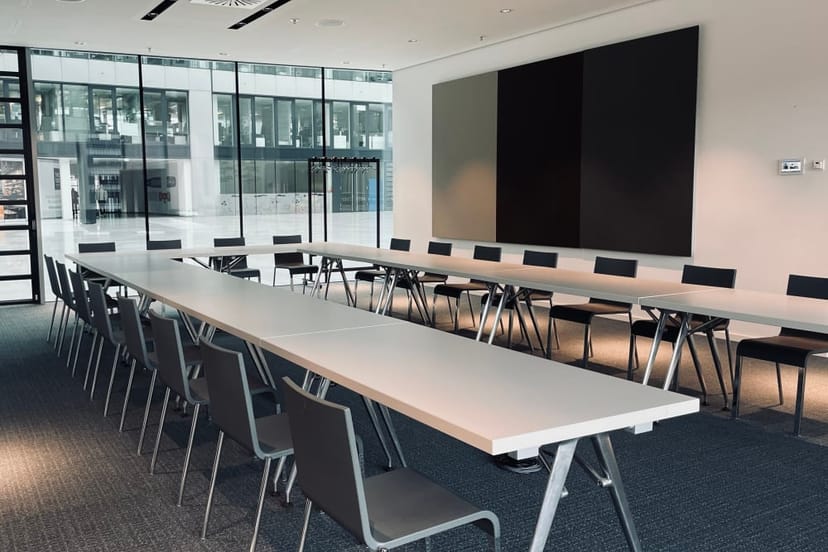 Modern U-shape conference room at THE SQUAIRE for board meetings and interactive workshops.