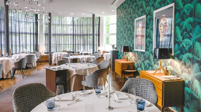 Upscale Restaurant Lafleur event space with textured decor for corporate dinners and VIP meetings.