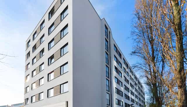 Hotel Frankfurt Messe exterior: modern corporate building for business events and meetings.