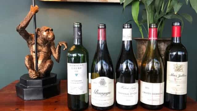 High-end indoor event space in Frankfurt with wine tasting setup for VIP receptions.