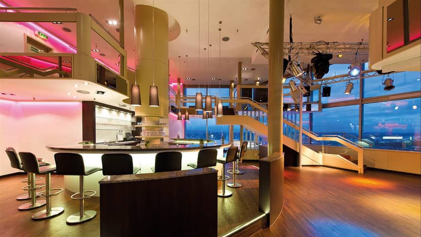 Multi-level event space in Leonardo Royal Hotel Frankfurt for cocktail receptions and product launches.