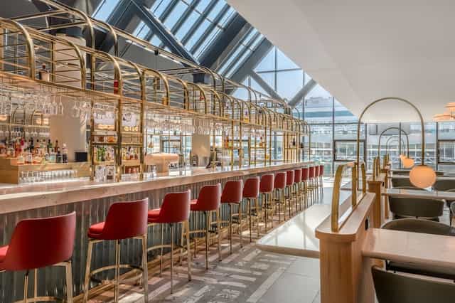 Frankfurt Airport Marriott hotel venue with glass ceiling for corporate event or cocktail reception.