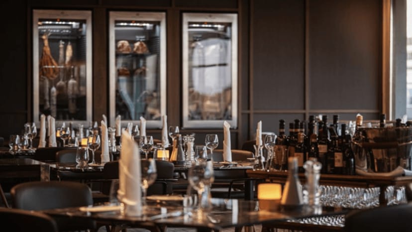 Frankfurt Airport Marriott high-end corporate dinner event space with elegant dry-aging display.