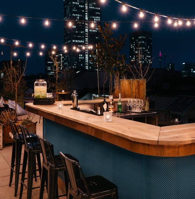Rooftop terrace with cityscape views for corporate receptions and networking events.