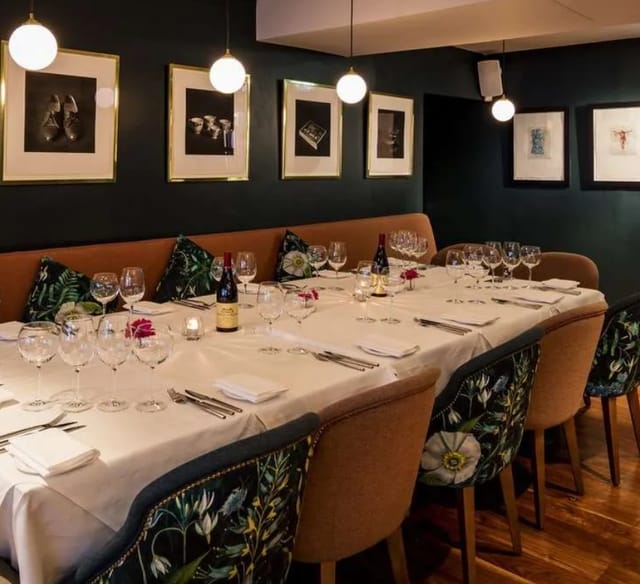 Scott Tallon private dining room with elegant glassware for corporate dinners and networking events.