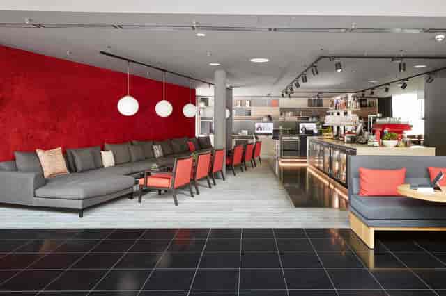 Modern lounge with modular seating for corporate networking and business coffee breaks.