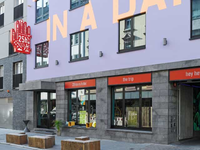 Vibrant exterior of 25hours Hotel The Trip, perfect for creative corporate retreats and events.