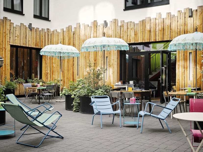 Modern outdoor terrace at 25hours Hotel The Trip for corporate networking and team building events.