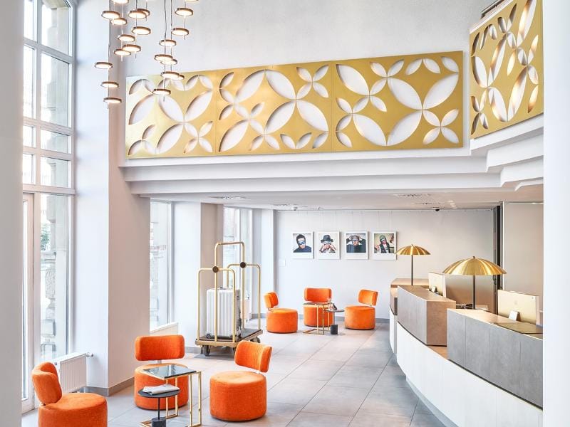 Modern hotel lobby for corporate meeting and event networking at Flemings Hotel Frankfurt-Central.