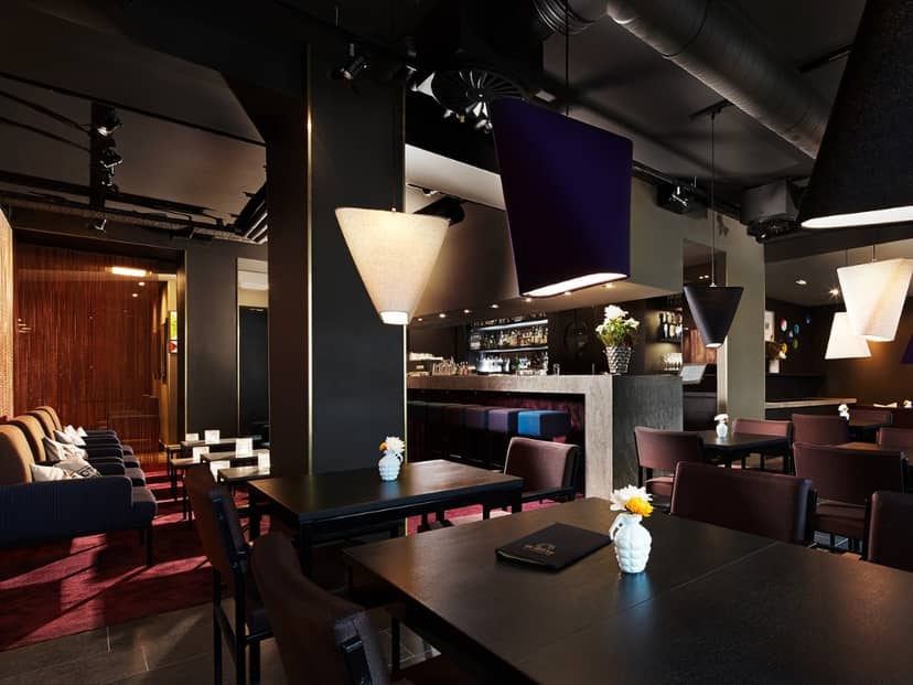 Oost Bar at 25hours Hotel: Sophisticated dark-toned corporate networking and VIP event space.
