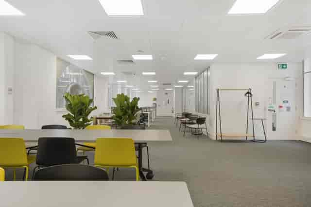 Oasis networking event space, whiteboards, workshop.