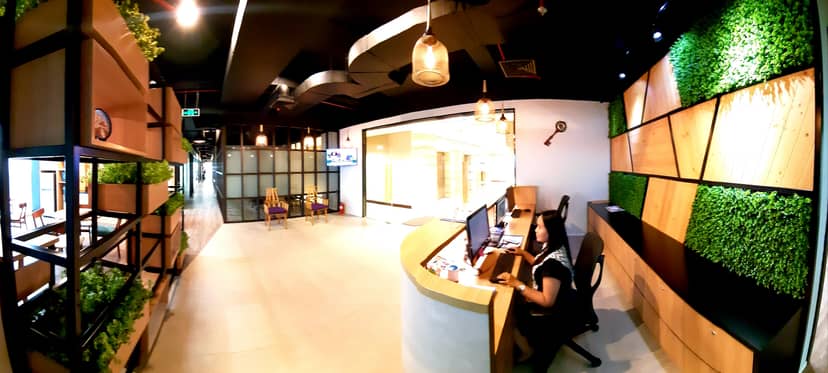 Modern Amethyst executive meeting room with biophilic design for boutique coworking and events.