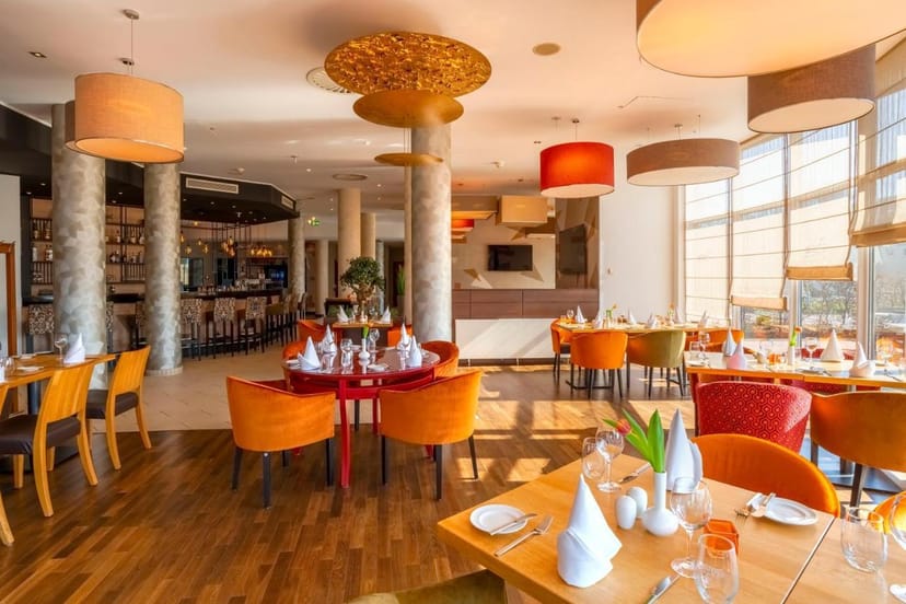 Stube at IB Hotel Frankfurt: vibrant event space for breakout sessions and corporate receptions.
