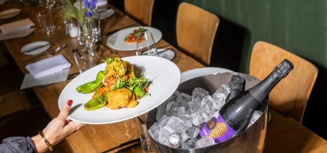 Gourmet banquet service with chilled wine at Courtyard Terrace, Margarete for premium events.