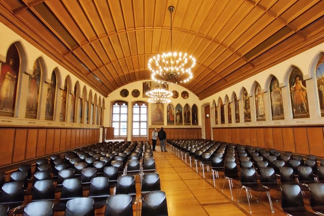 Kaisersaal historic venue with barrel-vaulted ceiling for lecture and ceremony event rental.