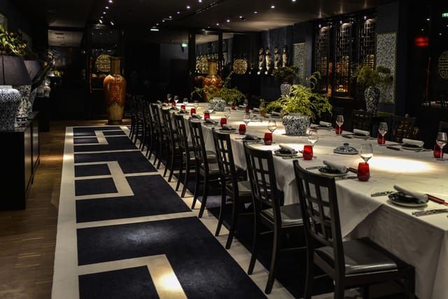 Private dining room in Zenzakan with long-table setup for corporate dinner and formal events.